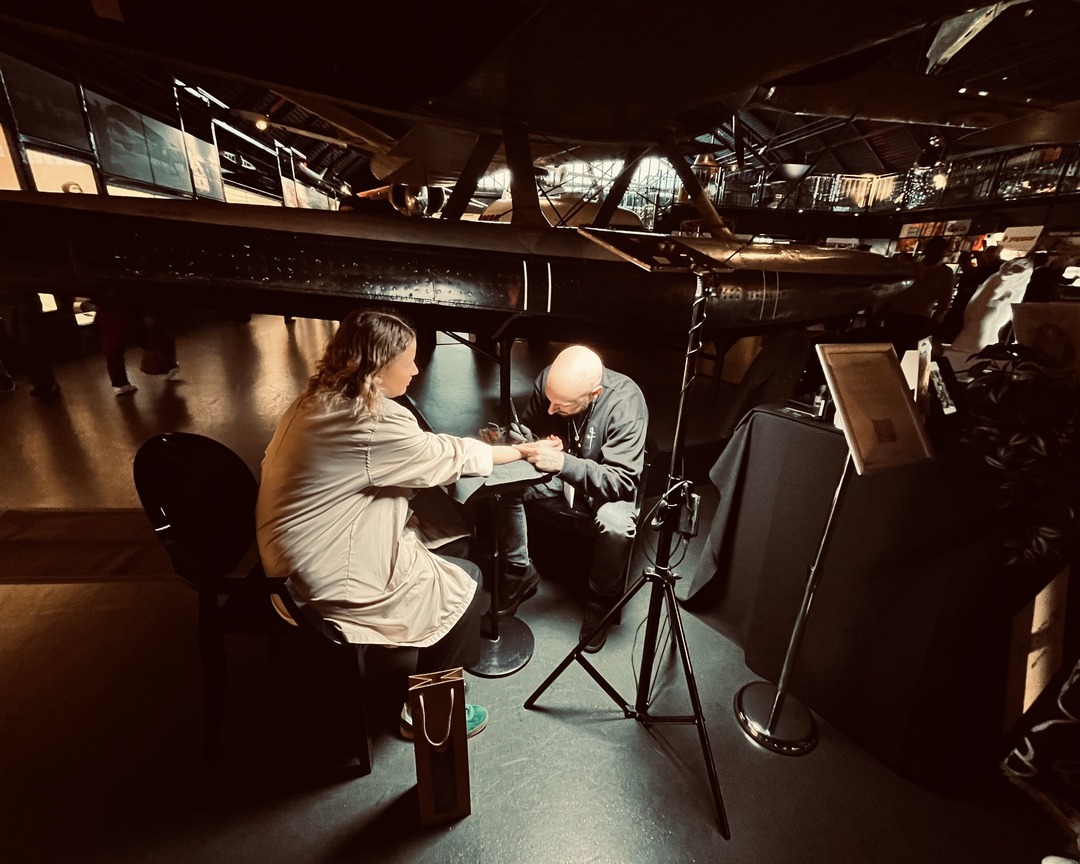 Matt Roe tattooing a guest at a London event