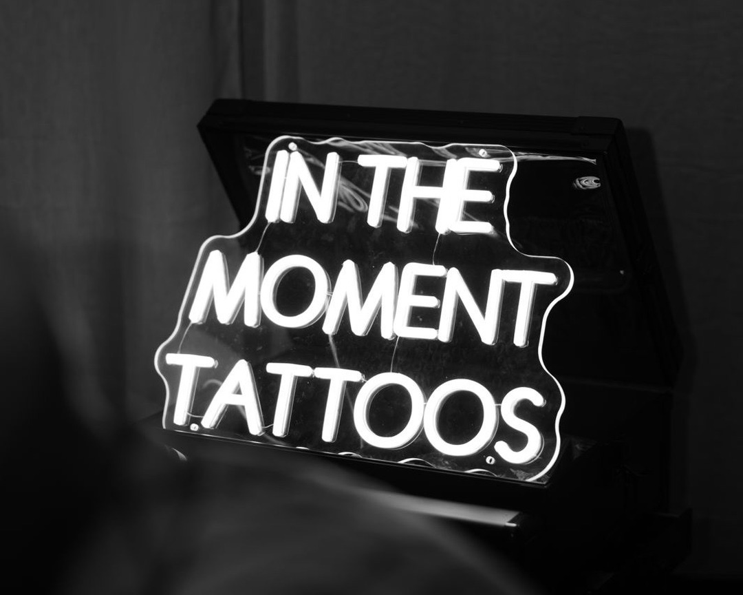 In The Moment Tattoos neon sign by Matt Roe