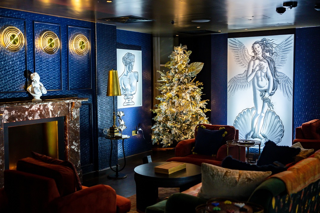 Matt Roe artwork and busts displayed in the lounge at The Other House