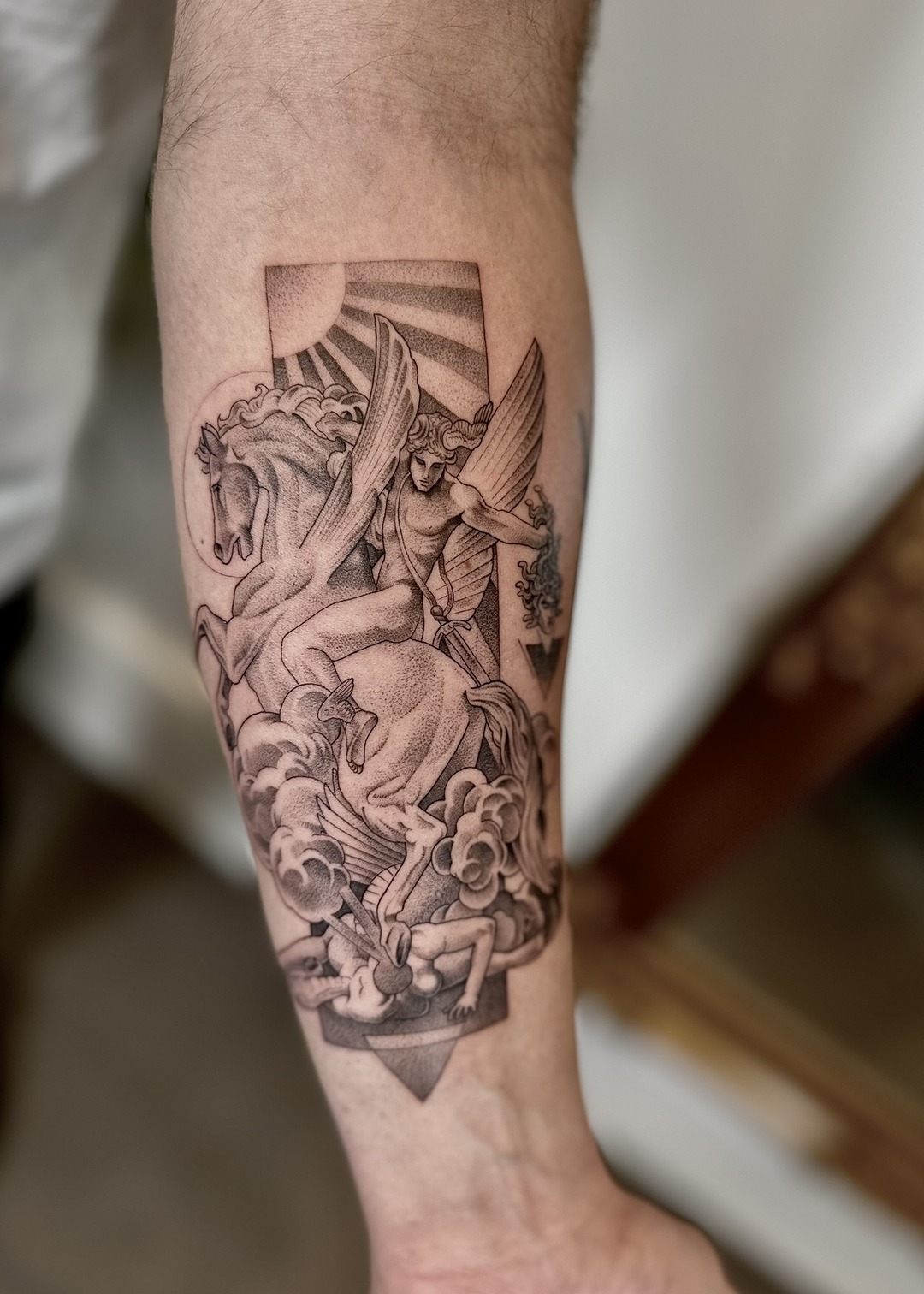 Perseus on Pegasus with Medusa calf tattoo, black and grey by Matt Roe, Kensington London
