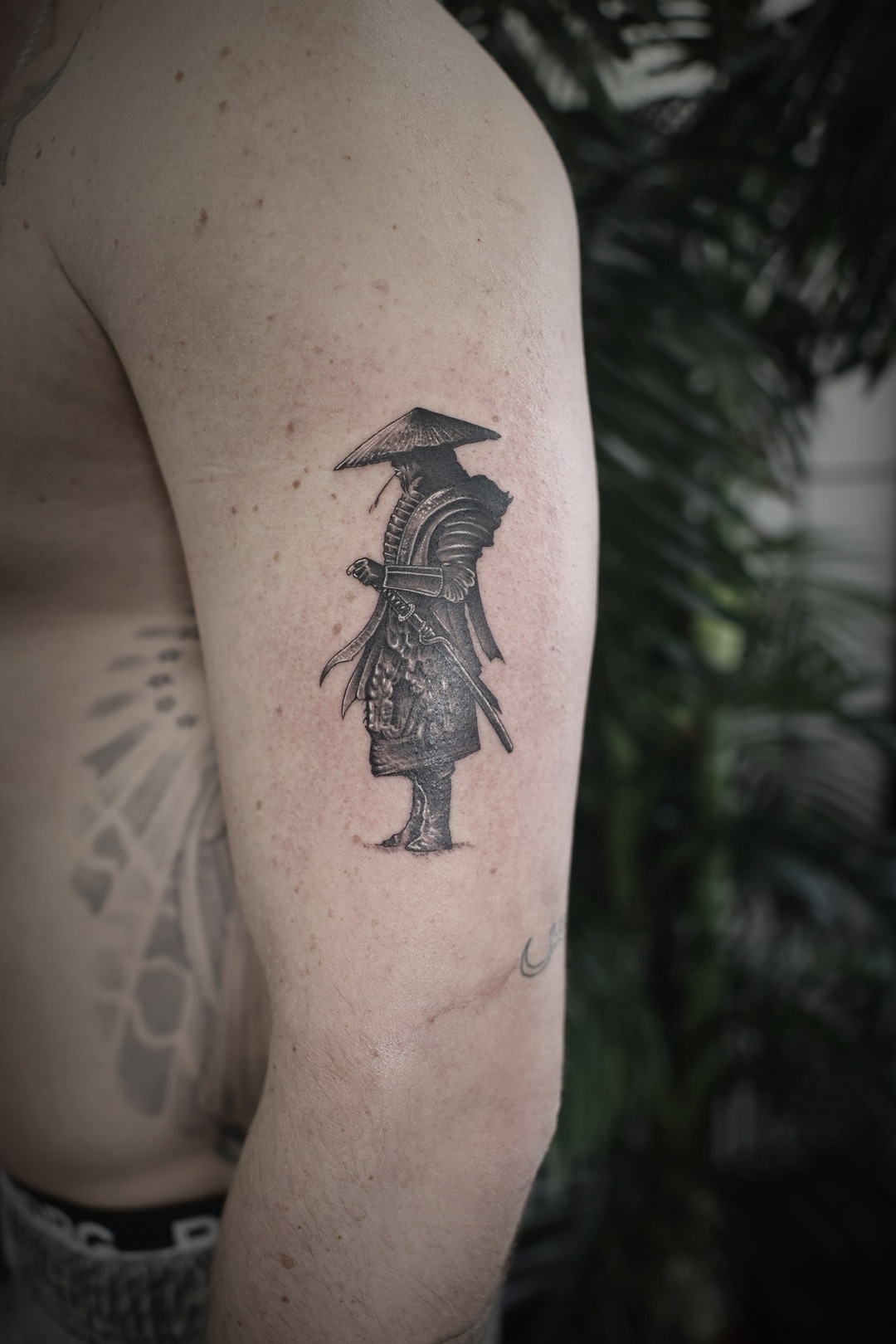 Pagoda temple, thigh tattoo, black and grey by Matt Roe, Kensington London