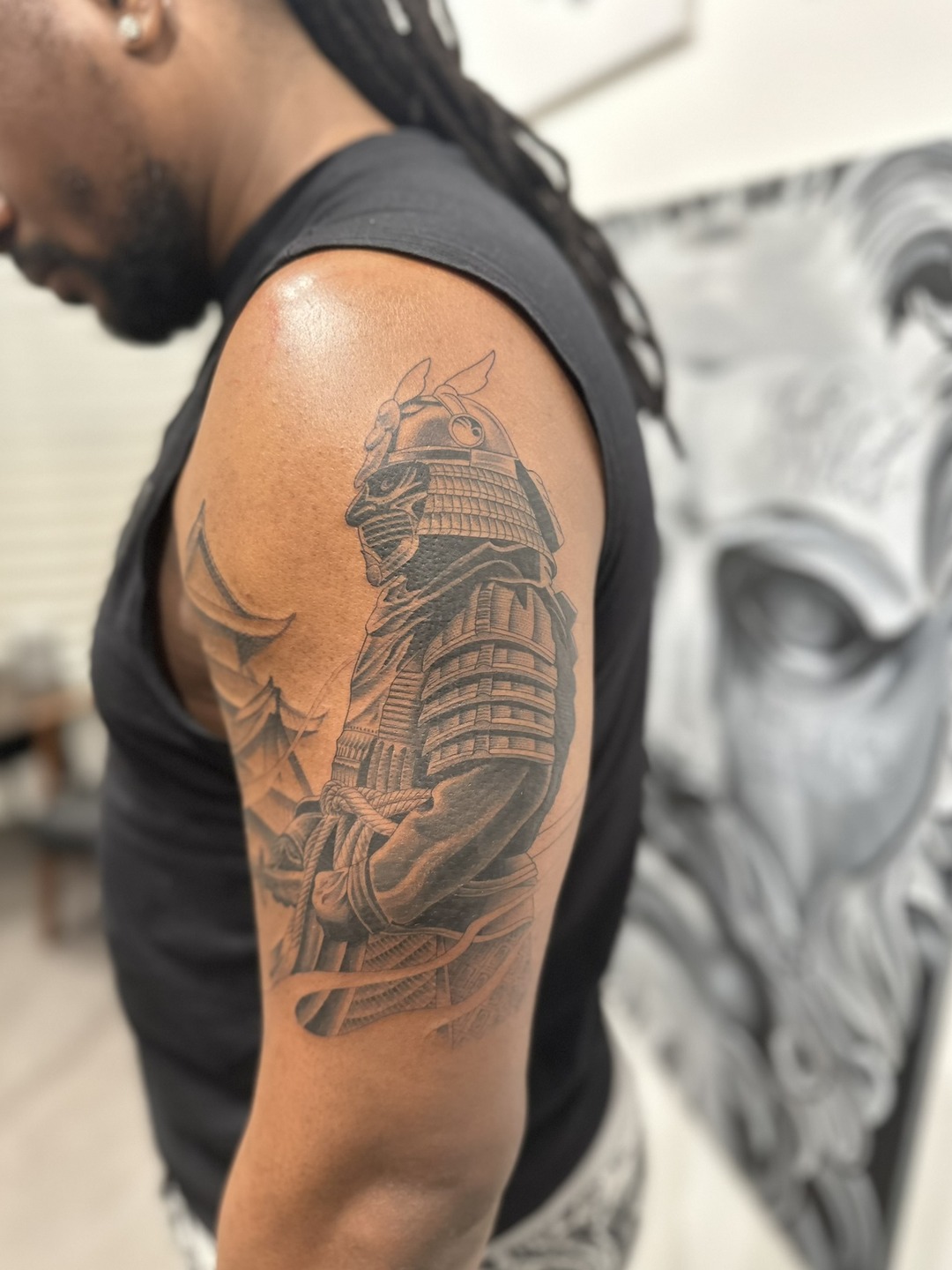 Armoured samurai warrior with pagoda, half sleeve tattoo, black and grey by Matt Roe, Kensington London