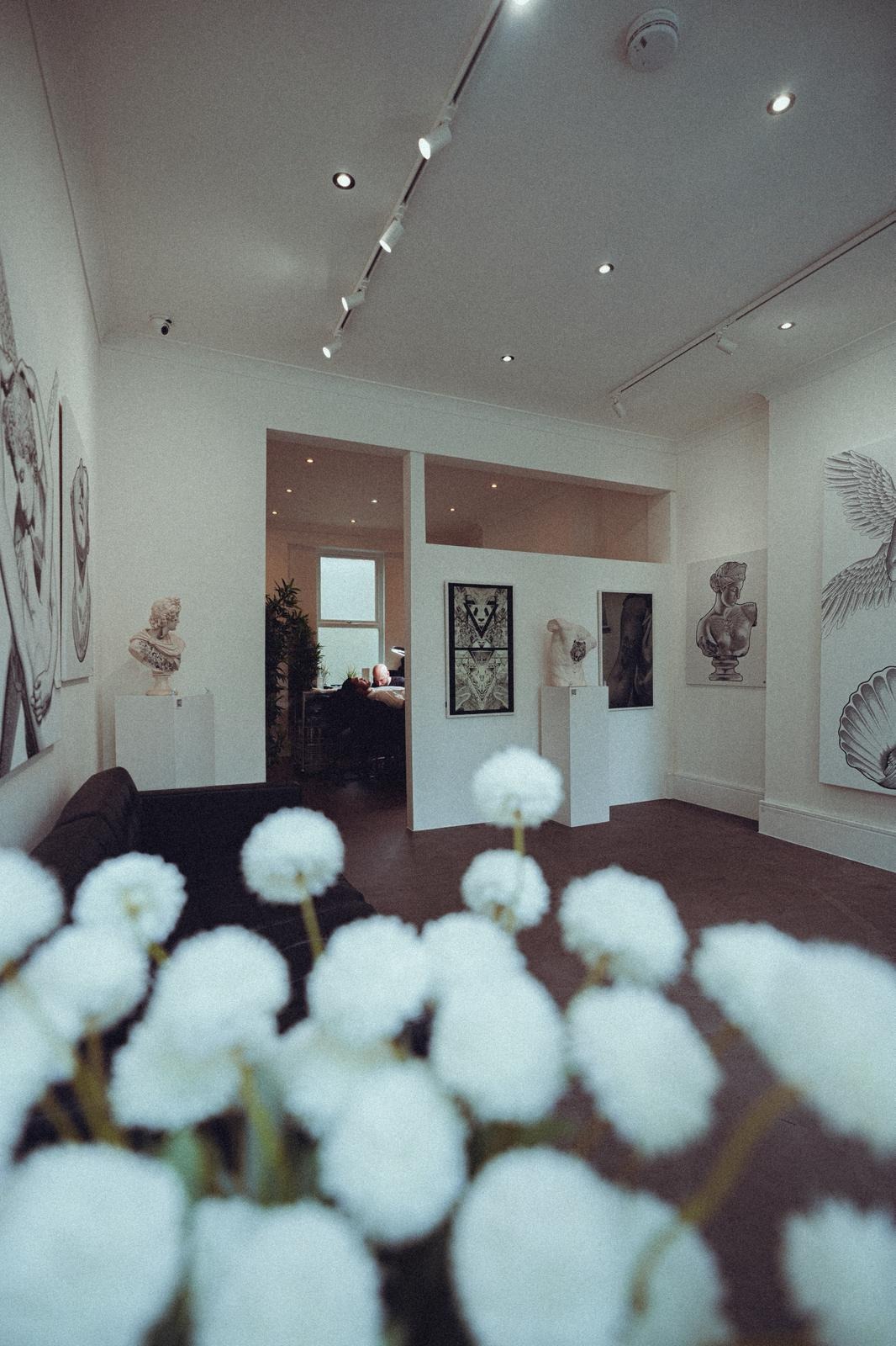 Matt Roe Studio gallery with artwork and busts on display, Kensington London