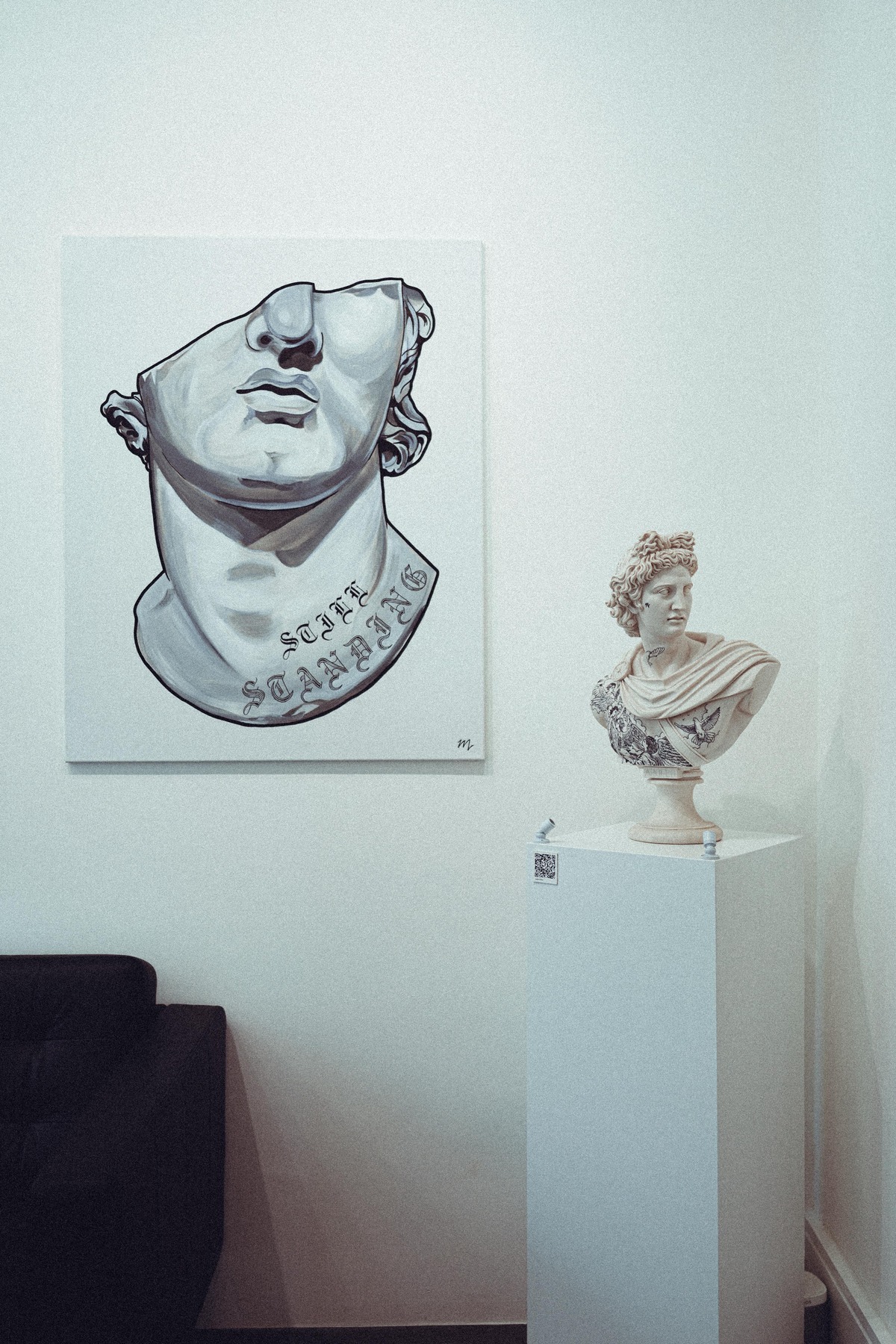 Stiff Standing artwork and tattooed Apollo bust on display at Matt Roe Studio, Kensington London