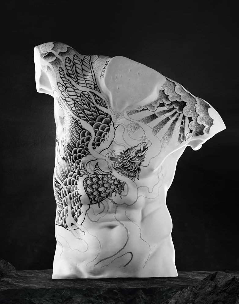 Tattooed torso sculpture with a phoenix and clouds by Matt Roe